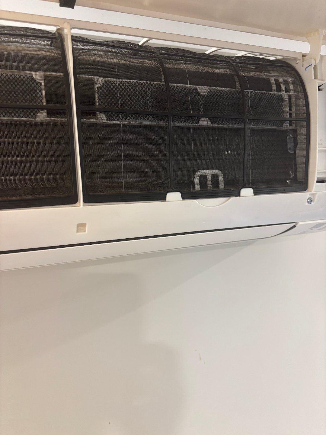 Clean split system indoor air conditioning unit mounted on a wall