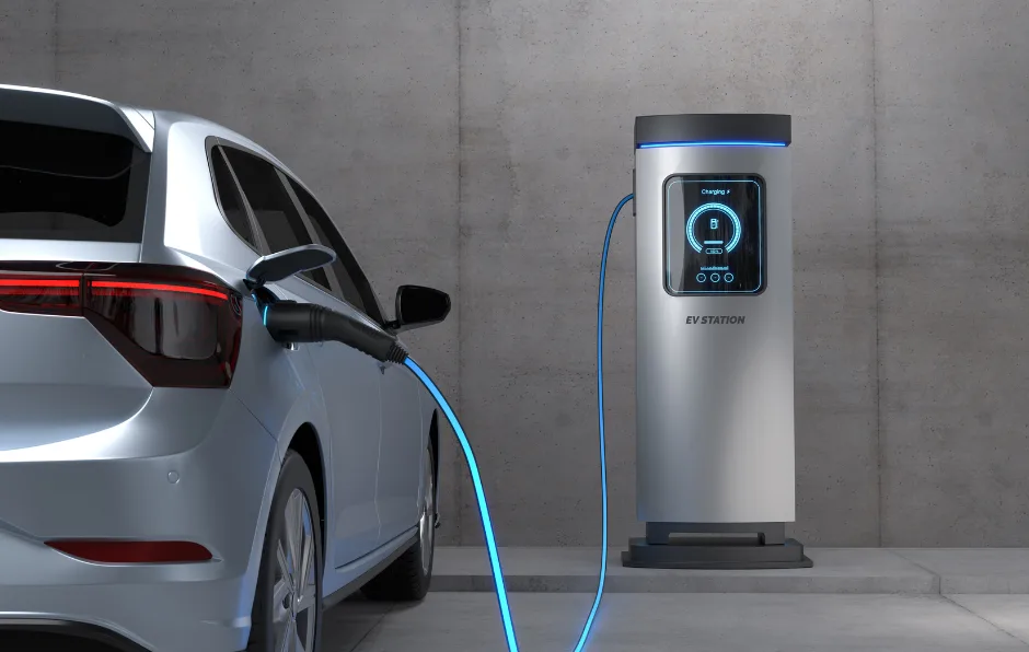 Electric vehicle charger installed at a home, connected and charging a car