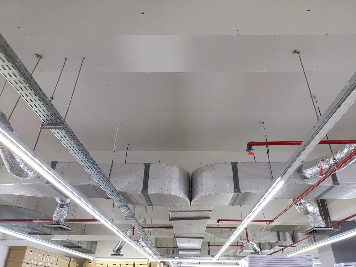 Rangehood ductwork installed in a kitchen ceiling