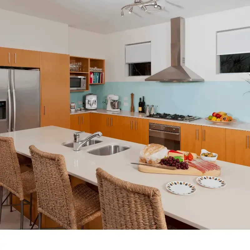 Rangehood installed above a stovetop in a modern kitchen