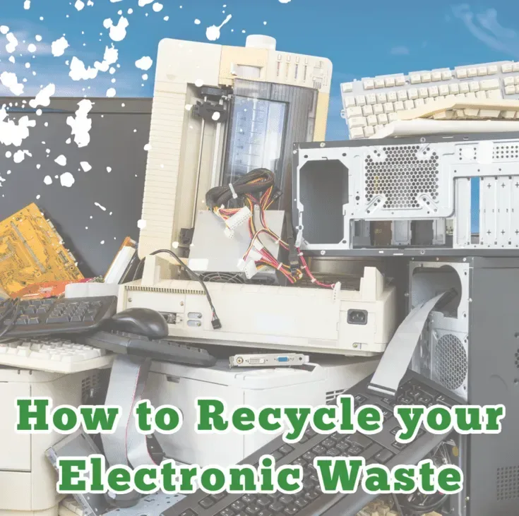 Pile of electronic waste including old computers, batteries and cables ready for recycling