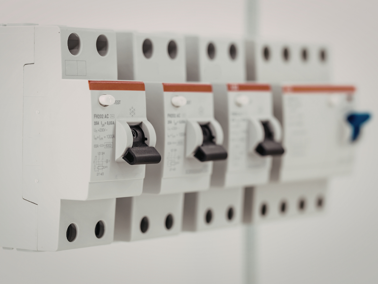 Safety switches and circuit breakers inside a switchboard