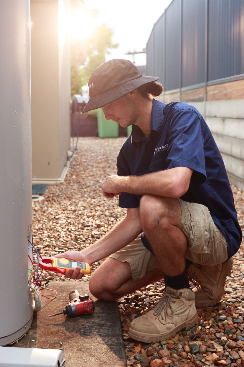 Triforce technician testing a switchboard on site